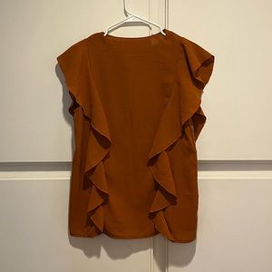 Burnt orange ruffle wave top